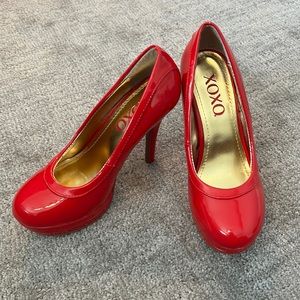 Xoxo bright red stiletto heels.  5 inch platform heels.  Size 6